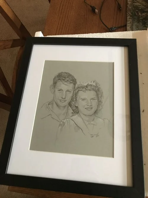 Couple portrait in black frame